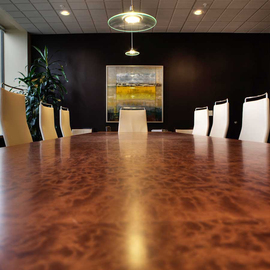 Personius Melber board room long view down table